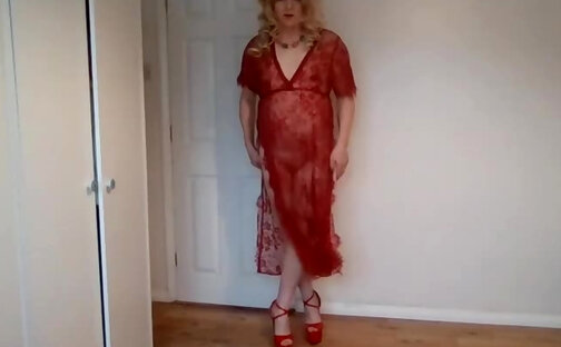 Blonde in red see-through nightdress