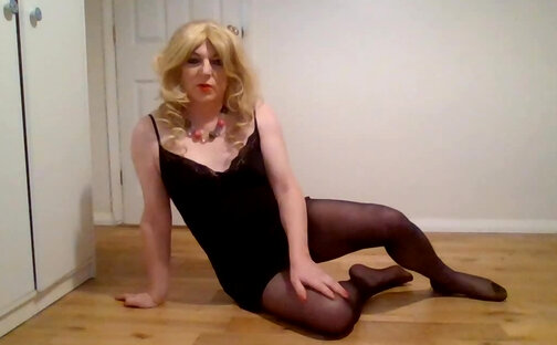 Jerking off in black pantyhose and lacy top