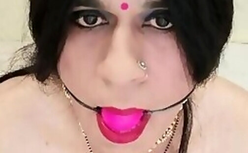 gagged Indian princess swallows own cum