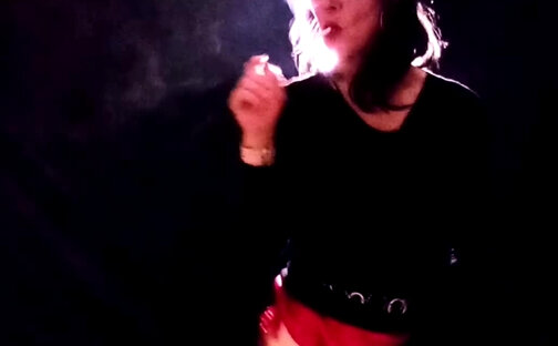 Sissy Fag smokes her double long Virginia Slim with her plug in