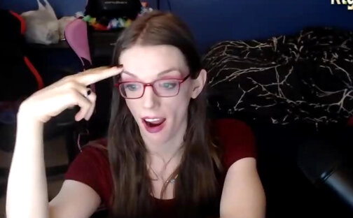 slender tranny in glasses jerking her big cock